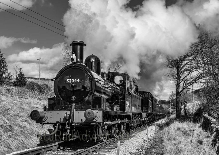 52044 and 85 depart Damems, Keighley and Worth Valley Railway