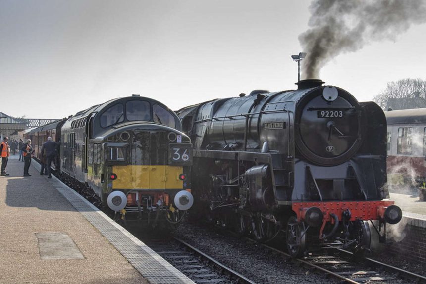Steam loco 92203 and a class 37