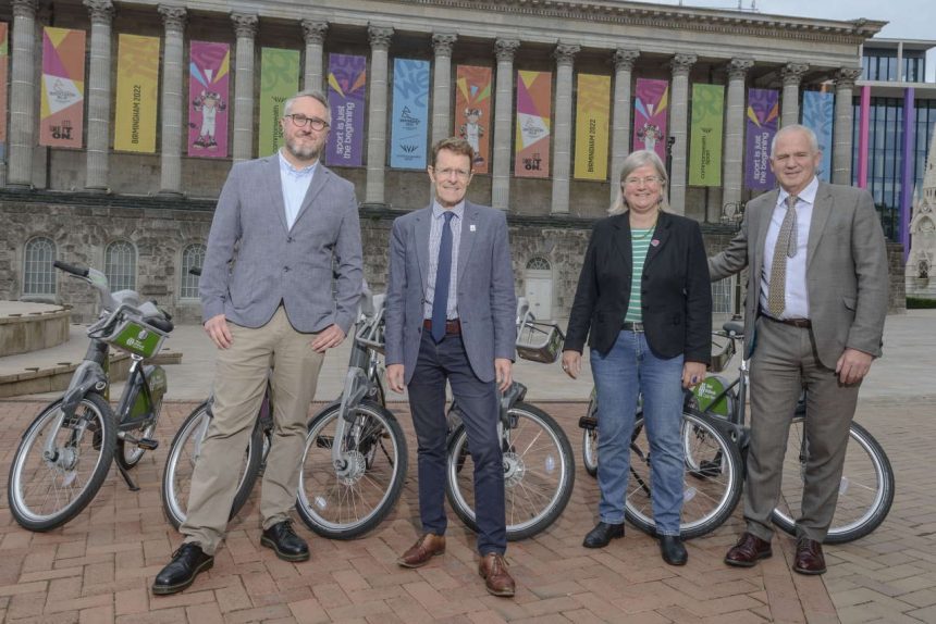L-R; Adam Tranter, Cllr Liz Clements, and Graham Jones, with the cycle hire bikes
