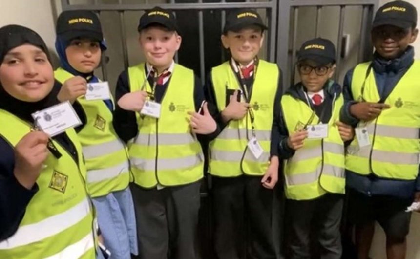 Two Merseyside schools have officially enrolled as mini British Transport Police officers.
