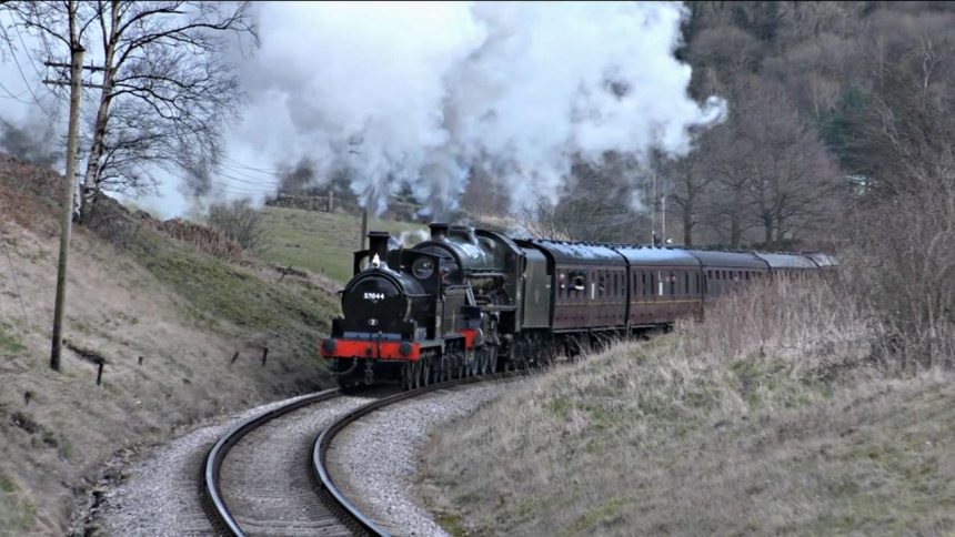 52044 and 45596 Bahamas approach Oakworth on the Keighley and Worth Valley Railway
