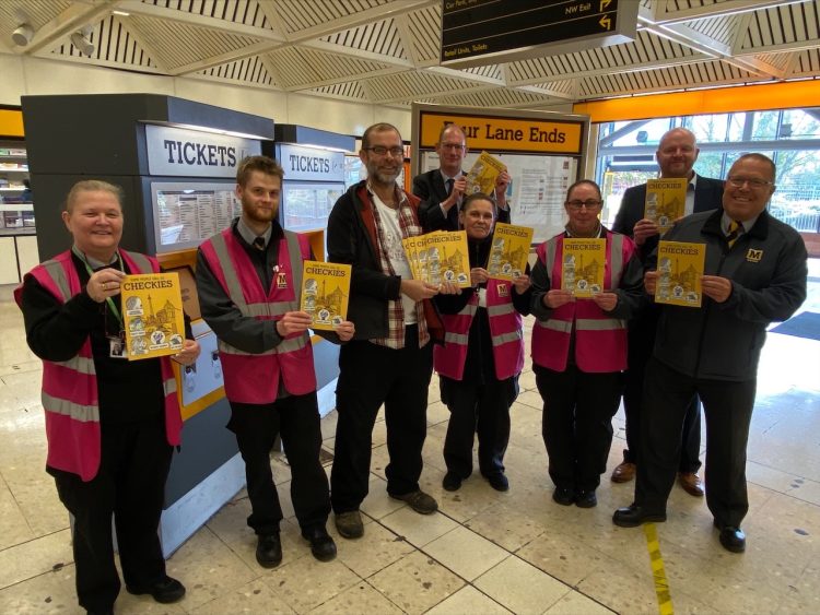 Metro Customer Service staff who feature in the comic with Metro comic book artist Mike Duckett and Nexus Customer Services Manager Huw Lewis and Metro Operations Director John Alexander.