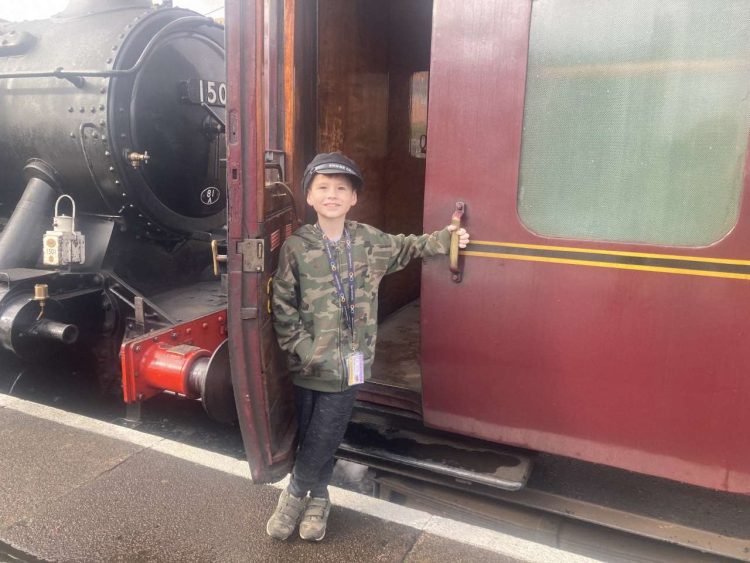All aboard! Corey Clark prepares to board the train at Kidderminster station. Lesley Carr