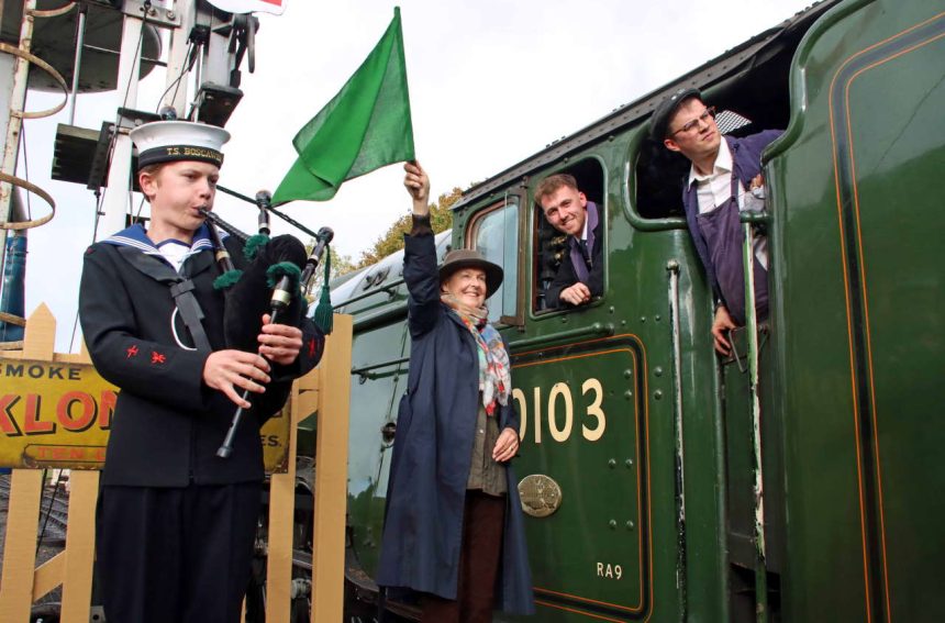 Penny Pegler waves off first Flying Scotsman train