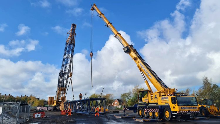 100 Tonne service crane building 800 tonne main crane during Carlisle recovery