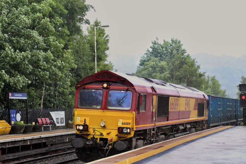 DB Cargo Class 66 leads a freight train through Todmorden