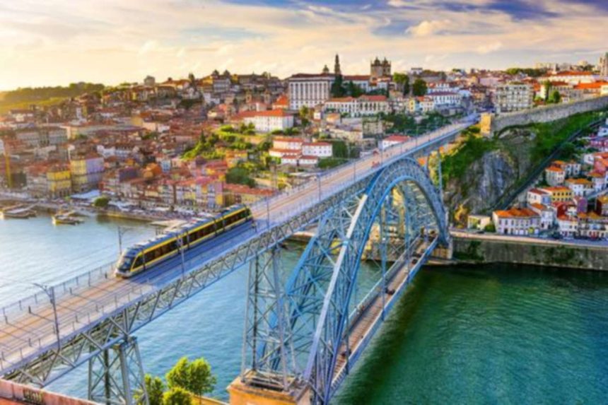 Porto, Portugal cityscape on the Douro River and Dom Luis I Bridge.