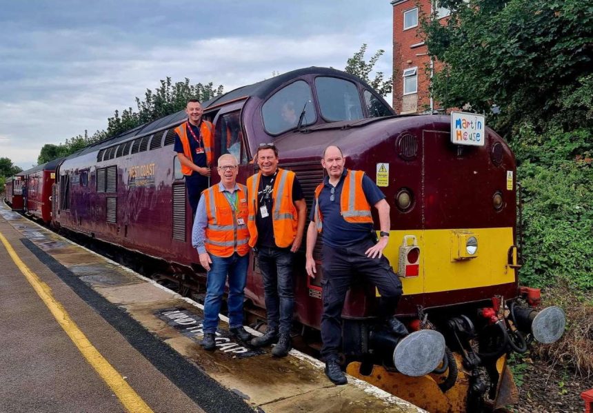 Jerry Dickinson (right), Mark Bridel (second right) and Kev Adlam (third right) during a Branch Line Society rail tour raising funds for Martin House.