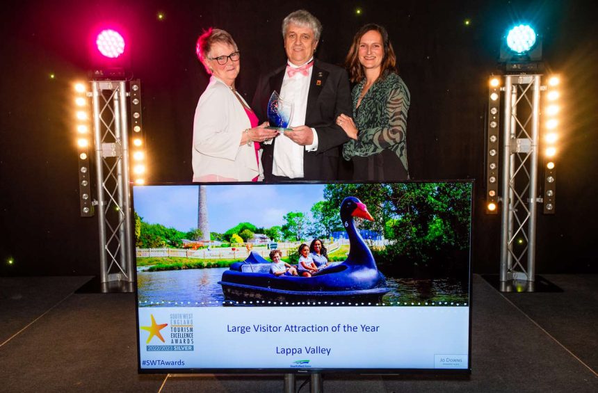 image of (l-r) Sara & Keith Southwell from Lappa Valley receiving their Silver South West Tourism Award from category sponsor, Jo Downs from Jo Downs Handmade Glass.