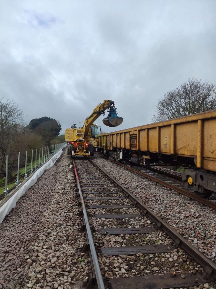 Dropping ballast to create the wider embankment