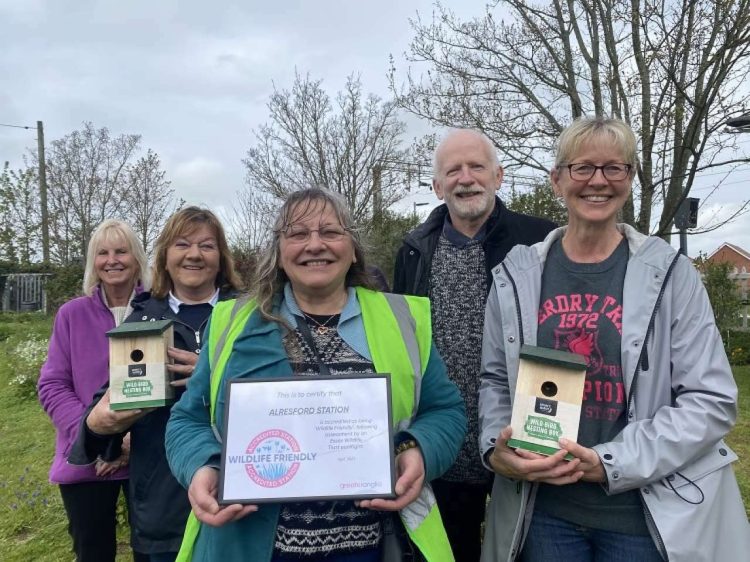 Weeley In Bloom volunteers with their accreditation.