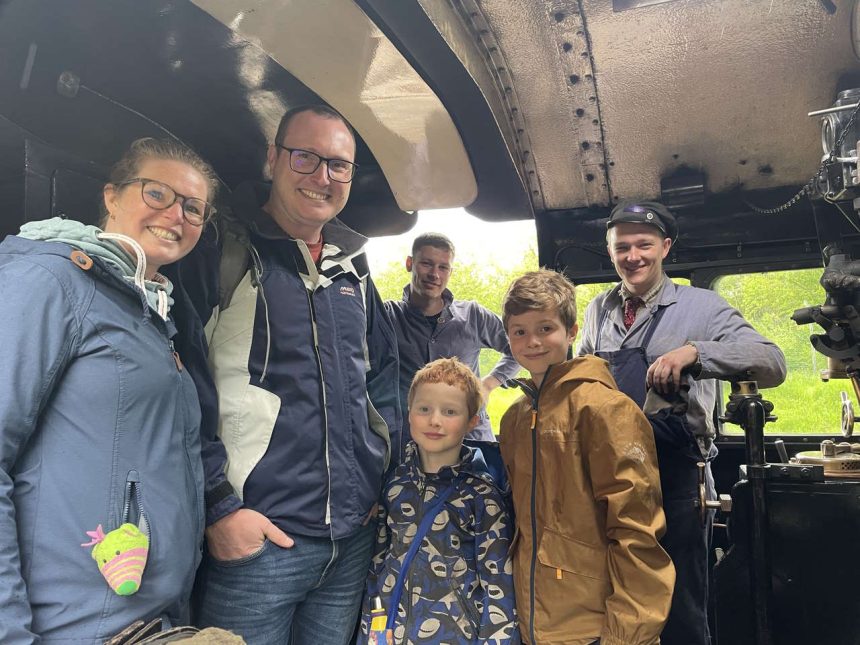 A family meet the loco crew on a Great Central Railway Steam Engine