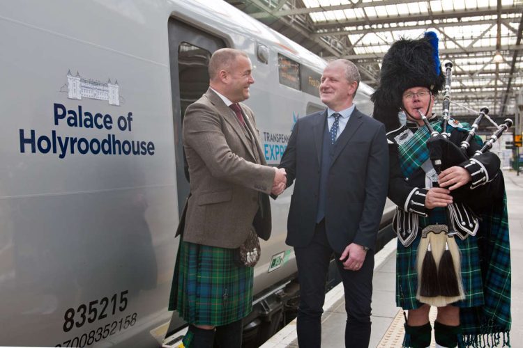 TPE's Graham Meiklejohn, Transport Scotland's Damian Briody, and The Border Piper, Sandy Mutch