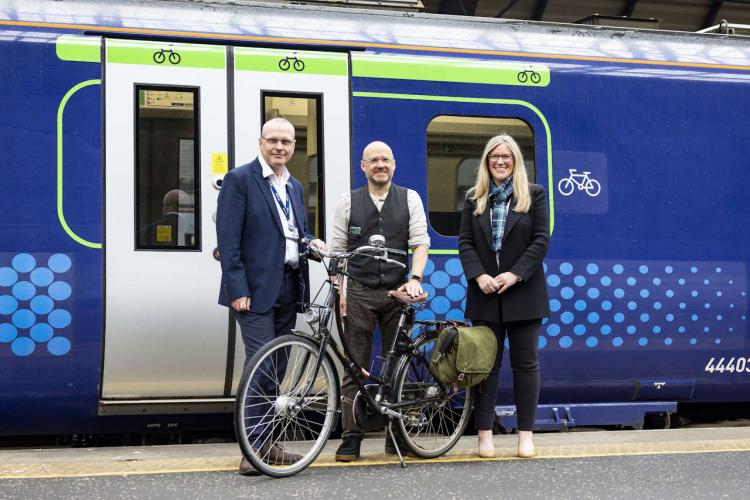 David Lister, ScotRail Safety, Engineering, and Sustainability Director; Patrick Harvie MSP, Minister for Active Travel; Trudy Lindblade, Chief Executive Officer, 2023 UCI Cycling World Championships.