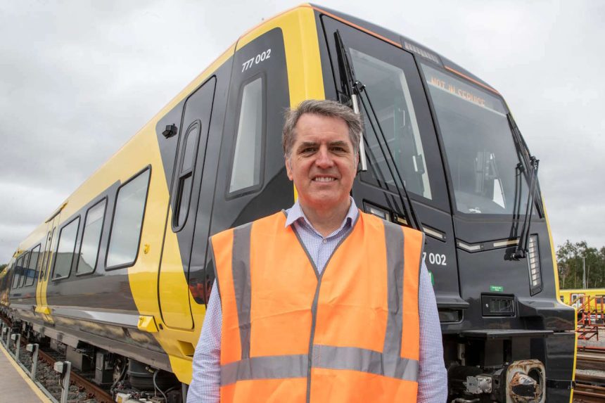 Mayor Steve Rotheram with one of the new 777 train units
