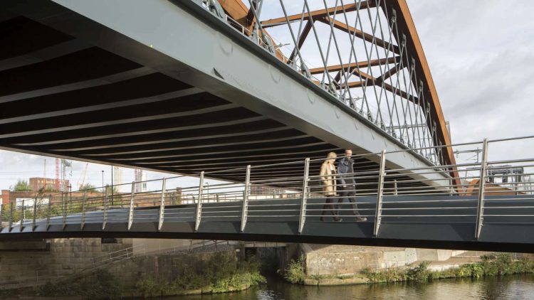 People crossing footbridge under Ordsall chord when completed in 2017 - Credit BDP _ Paul Karalius