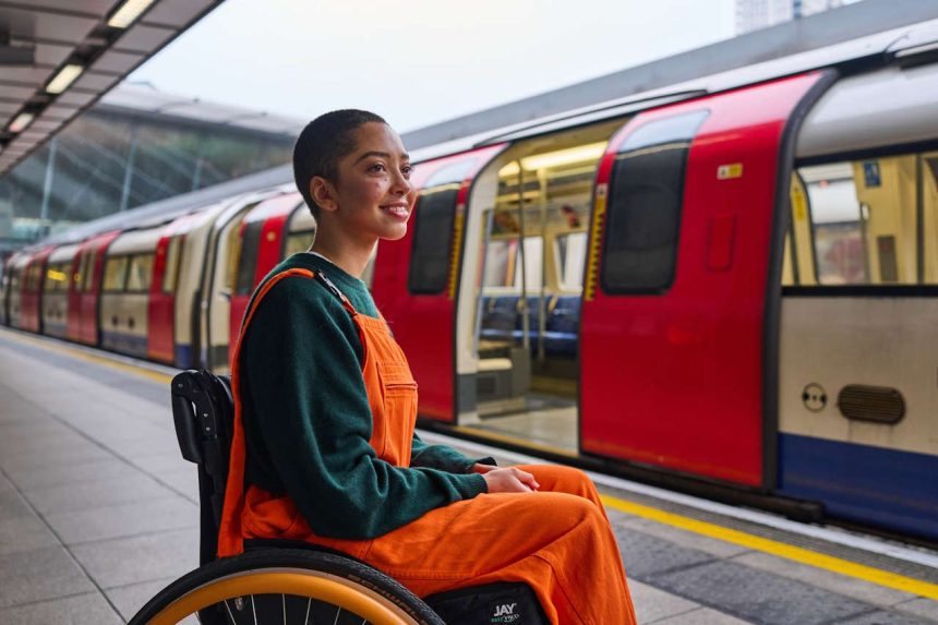 A customer in a wheelchair on the Jubilee line platform at Stratford Underground station
