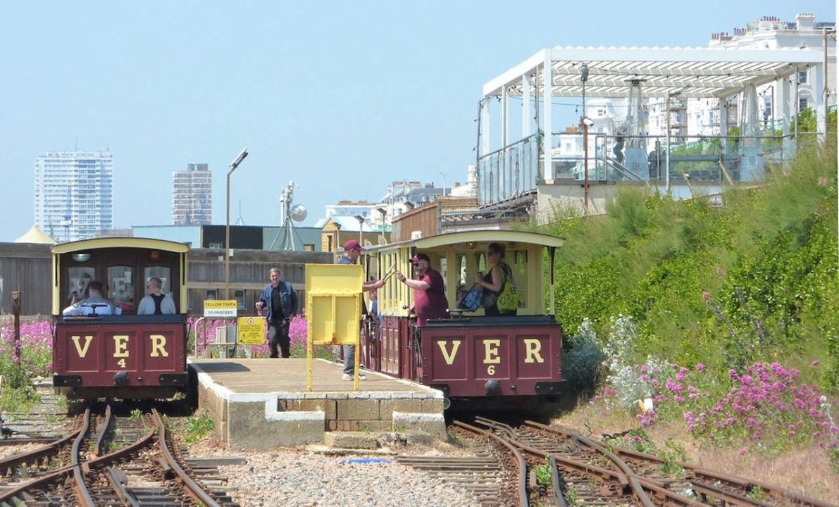 Volunteers at UK Power Networks pulled weeds at Volk's Electric Railway in Brighton to keep heritage train trips on track this summer.