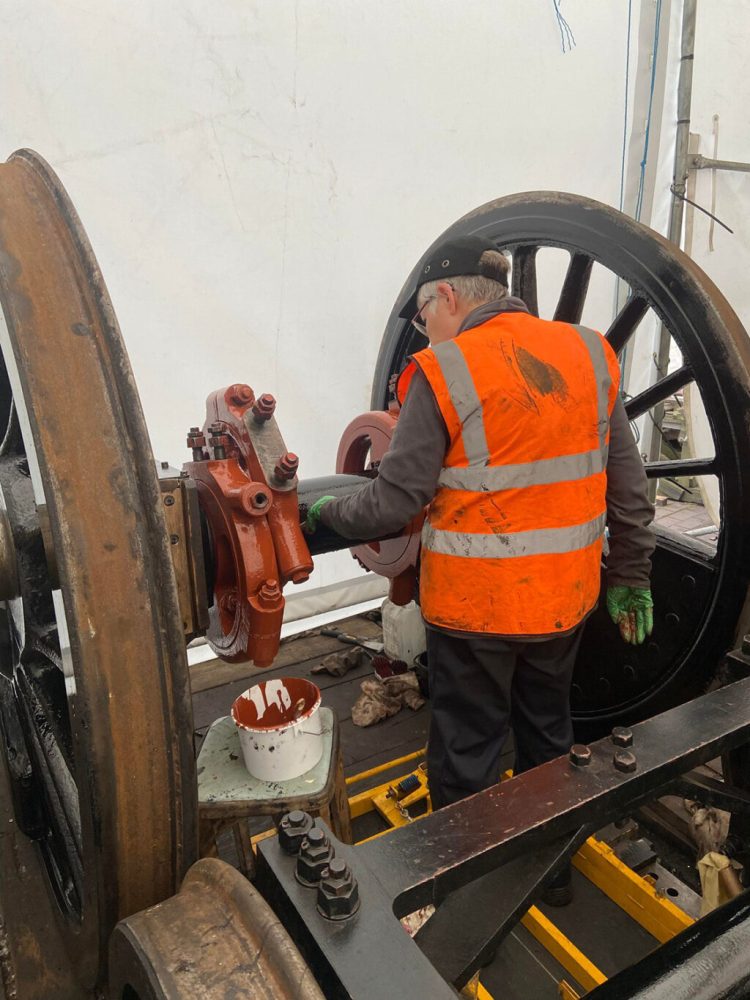On 22 July, trustee Jane Preece is seen putting the final coat on the driving wheelset axle