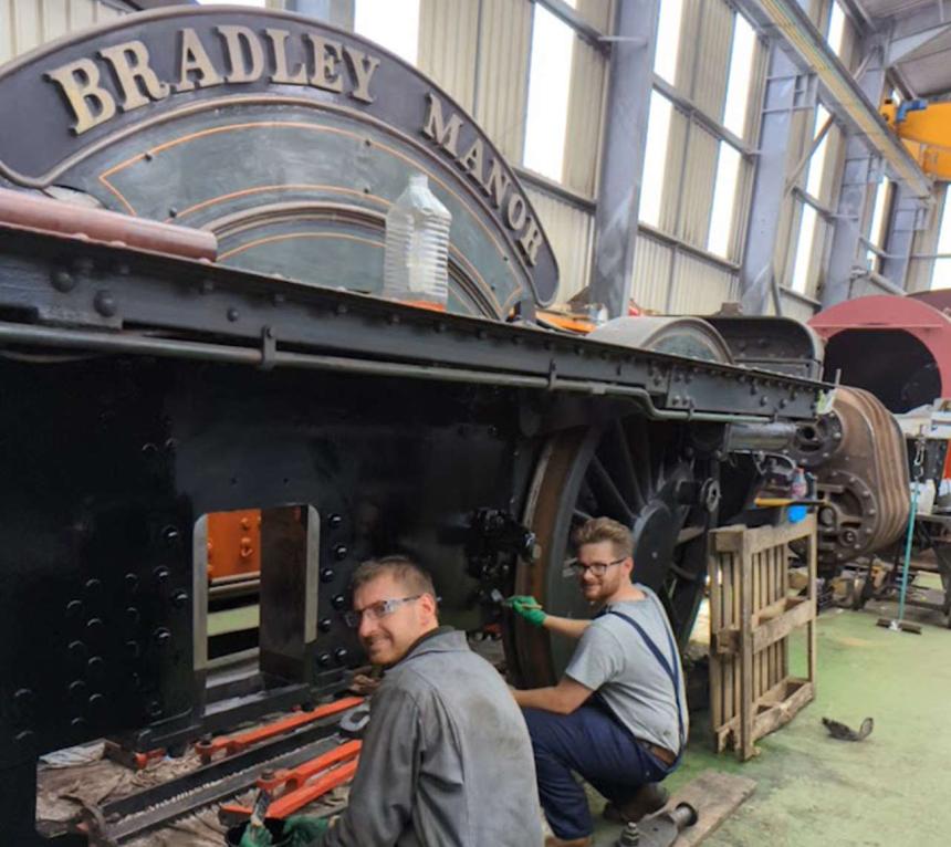 On 22nd July, trustee Chris Field and volunteer Ben Morris are seen happy in their work painting the frames in the space that the driving wheelset will occupy once replaced