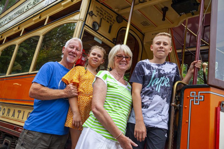 Family boarding a tram at Crich Tramway Museum // Credit: Crich Tramway Museum