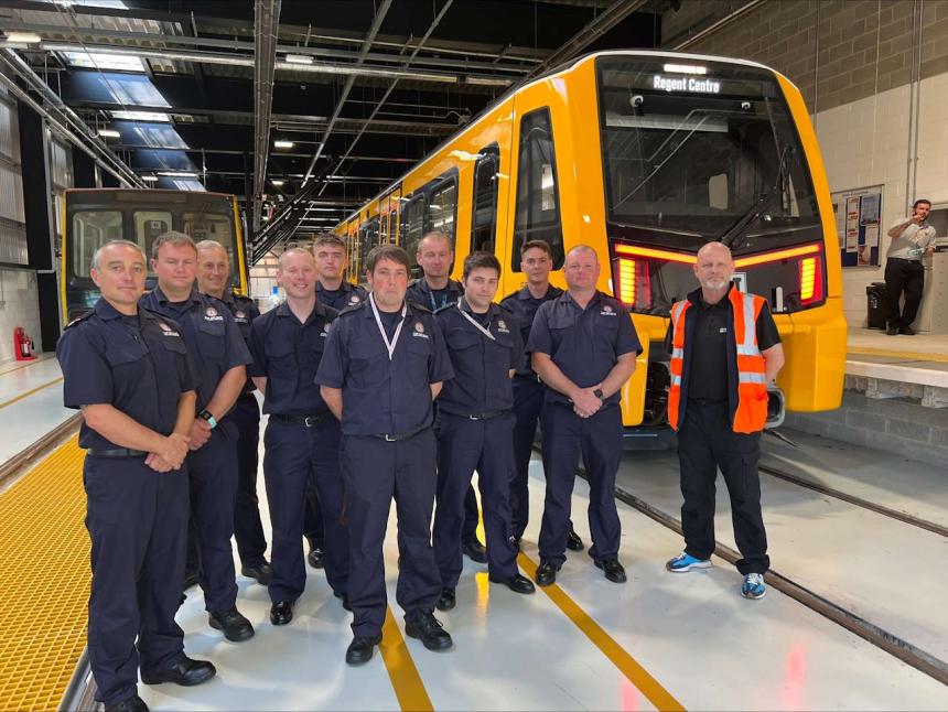 Blue Watch from Farringdon Fire Station in Sunderland with the new Class 555 Metro train at the Nexus Learning Centre in South Shields