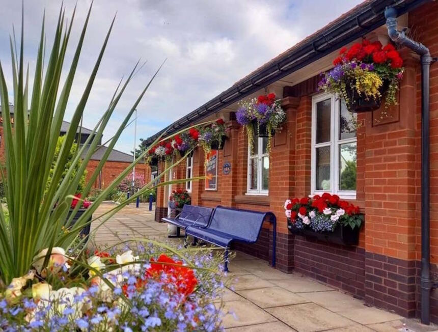 Image shows floral displays at St Annes on the Sea station