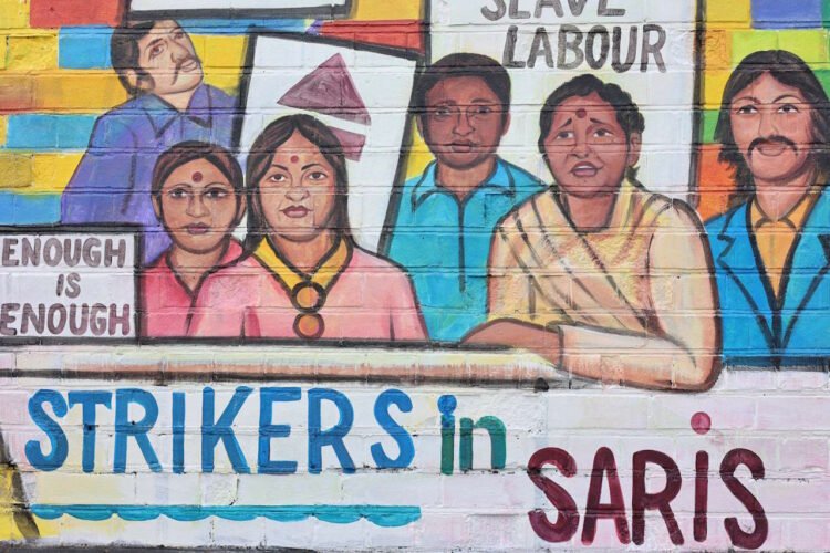 Mural depictting protesting South Asian factory workers in 1970s Birmingham