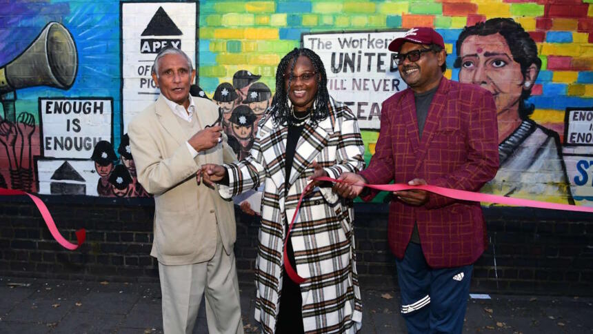 Ribbon cutting by Raghib Ahsan, Dr Janet Bailey and painter Haider Ali at Grunwick dispute mrual unveiling