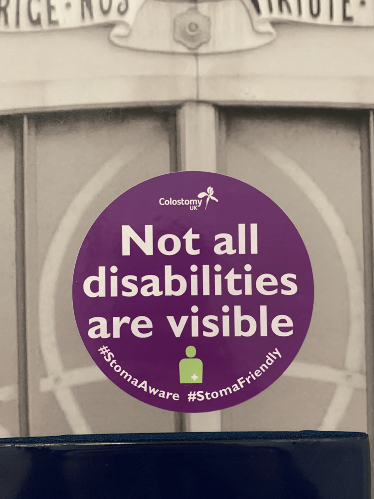 Signage on the door to reduce hostility towards those with hidden disabilities