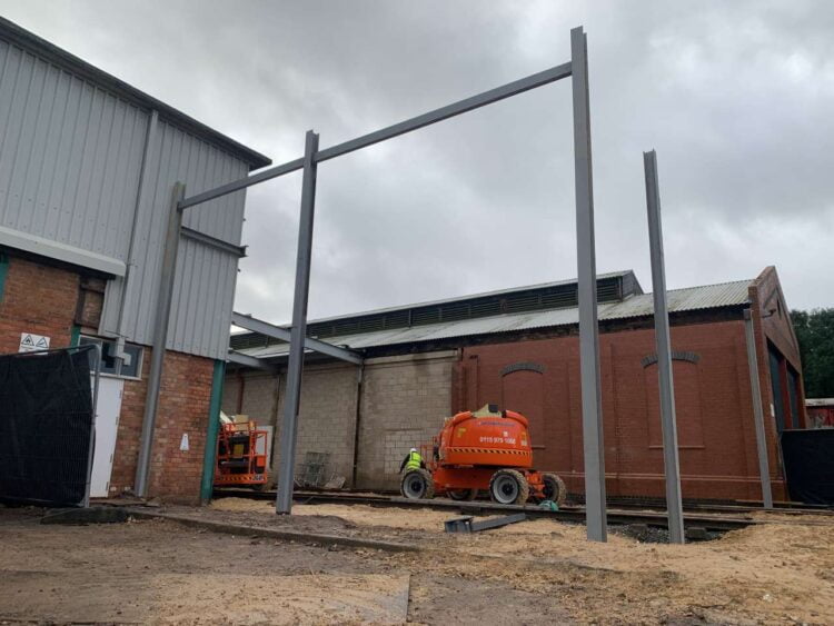 Steel uprights in place