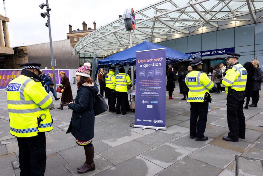 Police engage with commuters outside Kings Cross St Pancras station to raise awareness of a new sexual harassment campaign