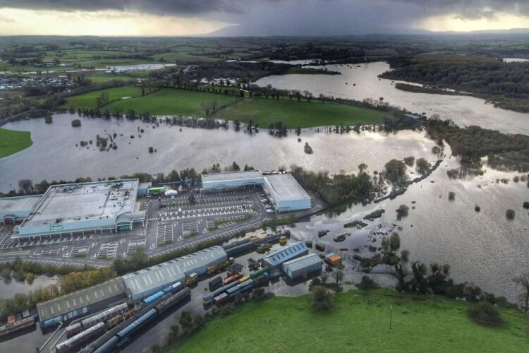 An overview of the station and wider railway area showing the extent of the flooding. [Lecale drone video/photos]
