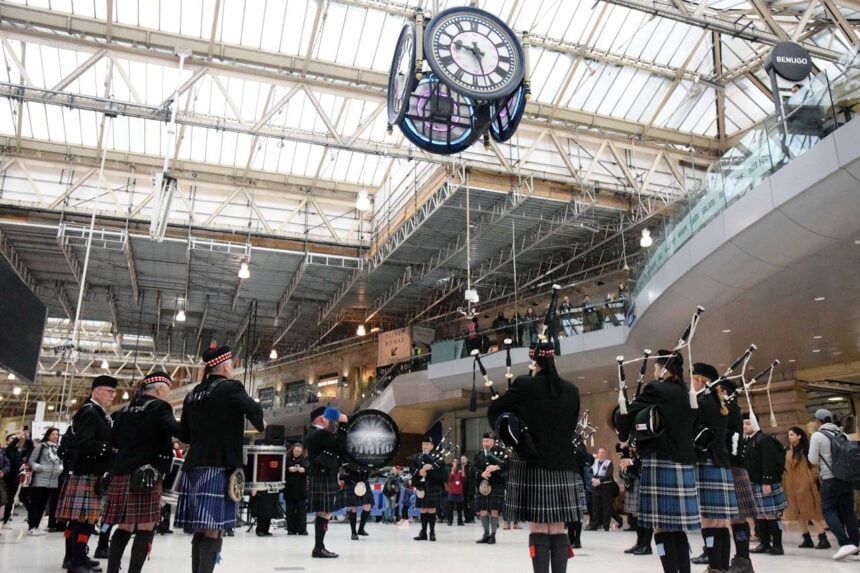 Wiltshire Caledonian Pipes and Drums under the clock at Waterloo. // Credit: South Western Railway