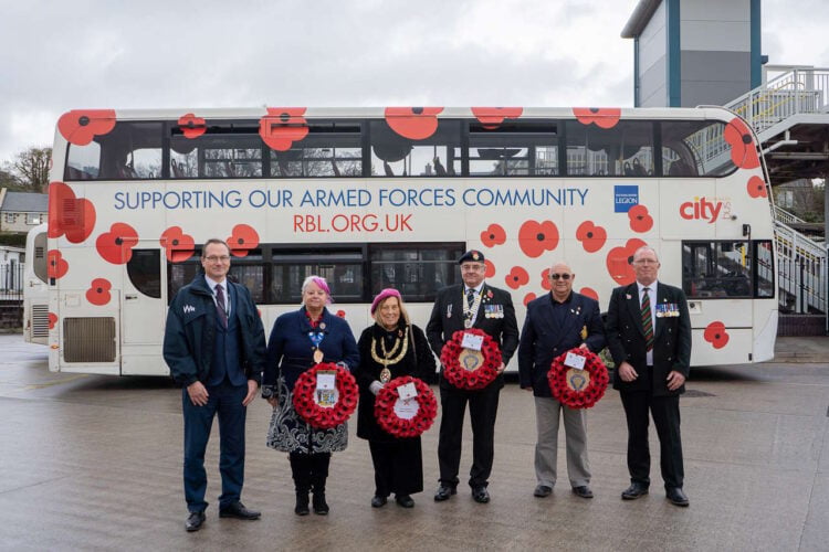 GWR colleagues and Go South West bus driver with Poppy decorated bus. // Credit: Great Western Railway 