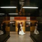 Sarah and Bradley Stamp celebrating their wedding on the Tyne and Wear Metro