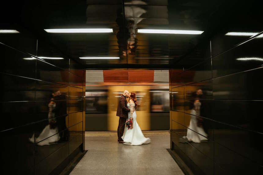 Sarah and Bradley Stamp celebrating their wedding on the Tyne and Wear Metro
