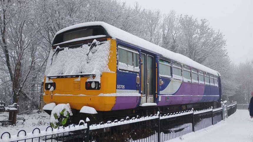 142055 in the snow at the Foxfield Railway