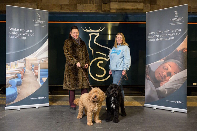 Caledonian Sleeper Managing Director and Founder, Trustee, and Chief Executive of Give a Dog a Bone Louise Russell at Glasgow Central. // Caledonian Sleeper