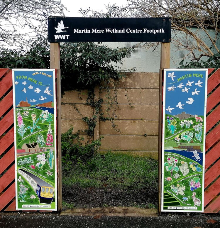 Image shows artwork by Burscough Bridge Methodist Primary with artist Angie Thompson at Burscough Bridge Station