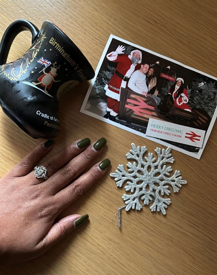Rachael's engagement ring and their polaroid picture souvenir