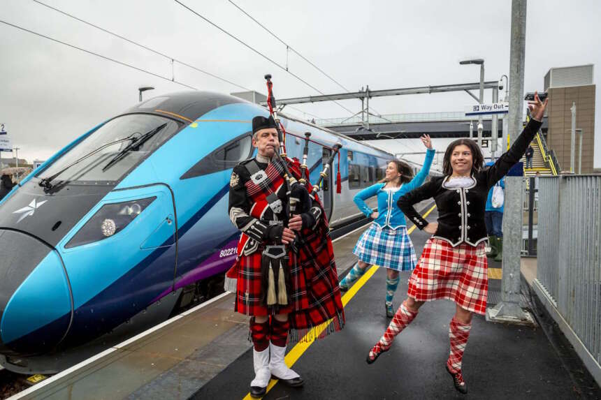 Roddy the Piper and Highland Dancers welcome in TPE’s newly named ‘Hailes Castle’ train at East Linton station