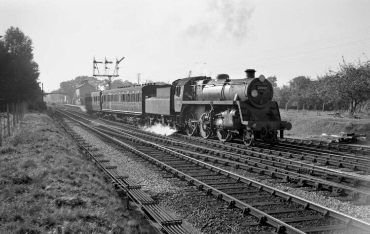 76007 with boiler 1052 departs West Moors station with a two coach local for Salisbury summer 1956 pic G Sivior_KRM copy