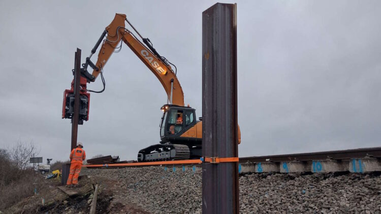 Driving piles at the Bicester landslip. // Credit: Network Rail