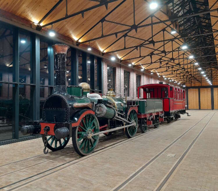 : 'Fire Queen', her tender and the Directors Coach become the first exhibits to enter the new museum at the Vale of Rheidol Railway, on the evening of 19th January 2024. Further exhibits will follow in the next few weeks. The museum is due to open to the public in late March, when the railway opens again for the new season