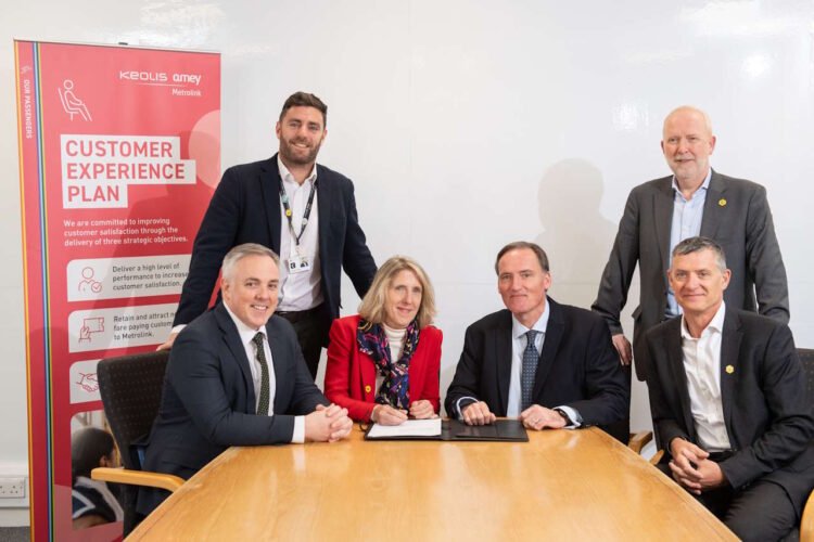 Representatives from TfGM and KAM meet to formally sign the contract extension. // Credit: Transport for Greater Manchester 