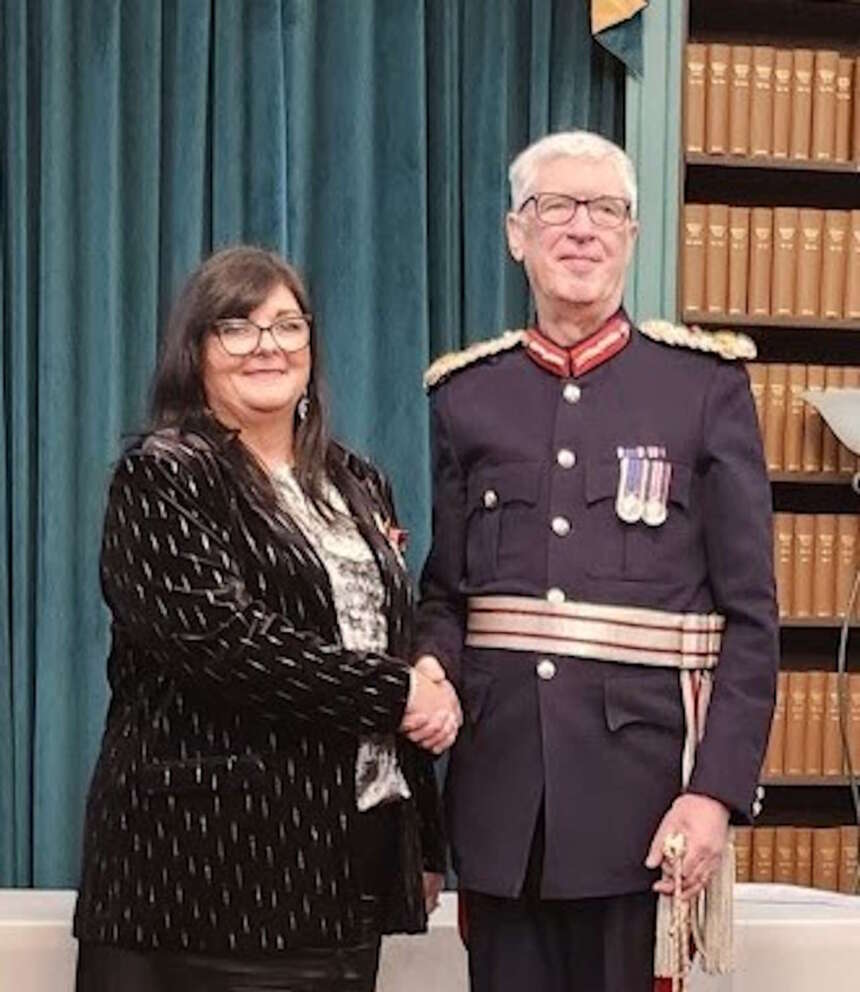 Sally Ralston BEM pictured with the Lord Lieutenant of Liverpool, Mark Blundell.