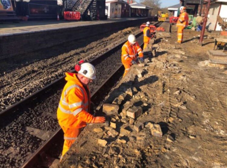 Working on Platform 1 at Sheffield Park. // Credit: The Bluebell Railway 