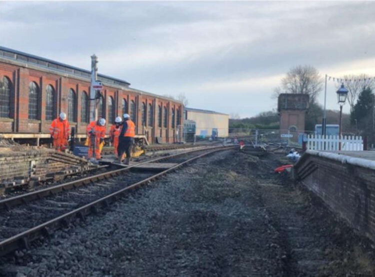 Installing new point rodding stools at Sheffield Park. // Credit: The Bluebell Railway 