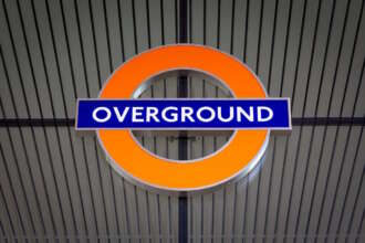 Close up of a London Overground roundel at West Hampstead station